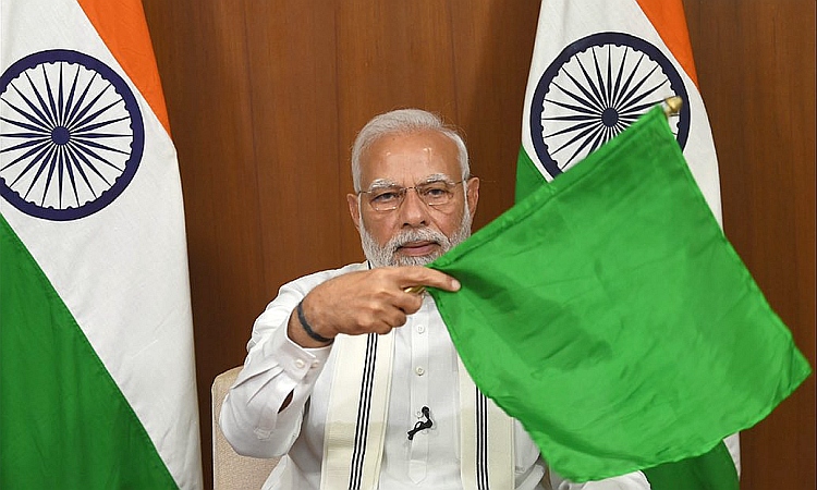 PM Narendra Modi flagging up Howrah-New Jalpaiguri Vande Bharat express